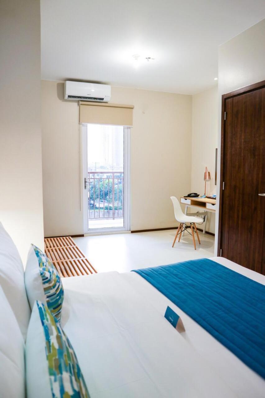 The Cirque Serviced Residences Quezon City Extérieur photo